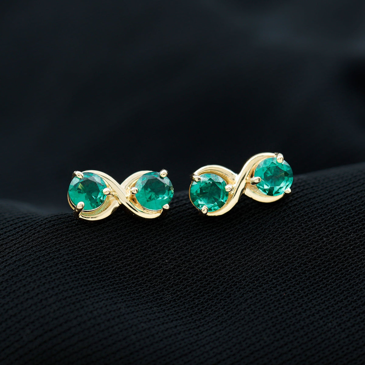 Lab Grown Emerald Infinity Stud Earrings