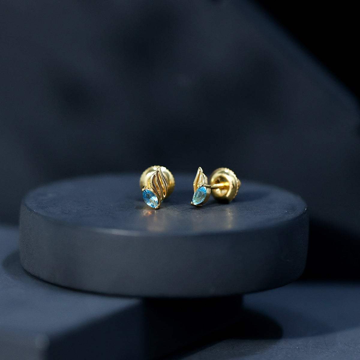 Natural Swiss Blue Topaz Leaf Earrings in Silver