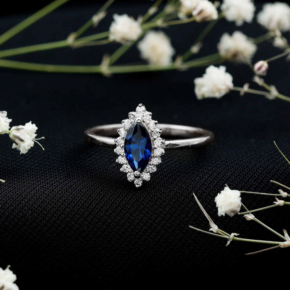 Marquise Cut Lab Grown Blue Sapphire and Diamond Halo Engagement Ring