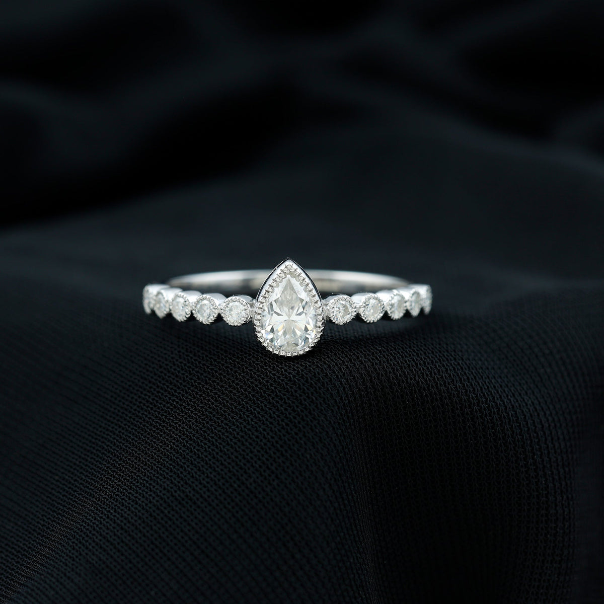 Lab Grown Diamond 0.6 Carat Pear Shaped Engagement Ring With Side Stones