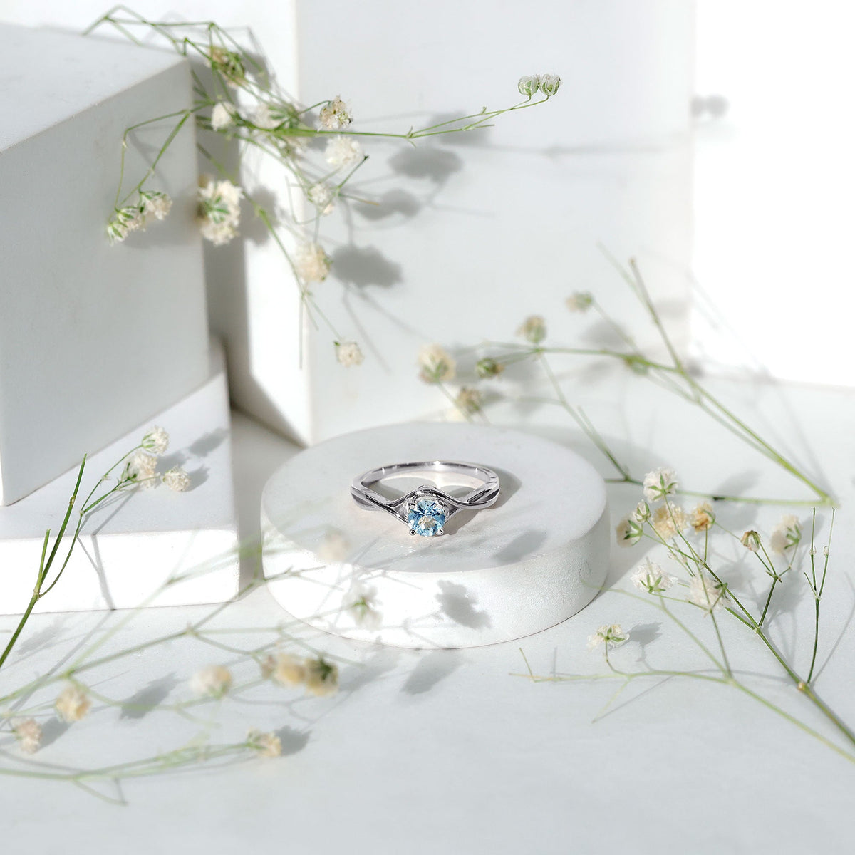 Solitaire Aquamarine Birthstone Ring with Crossover Shank