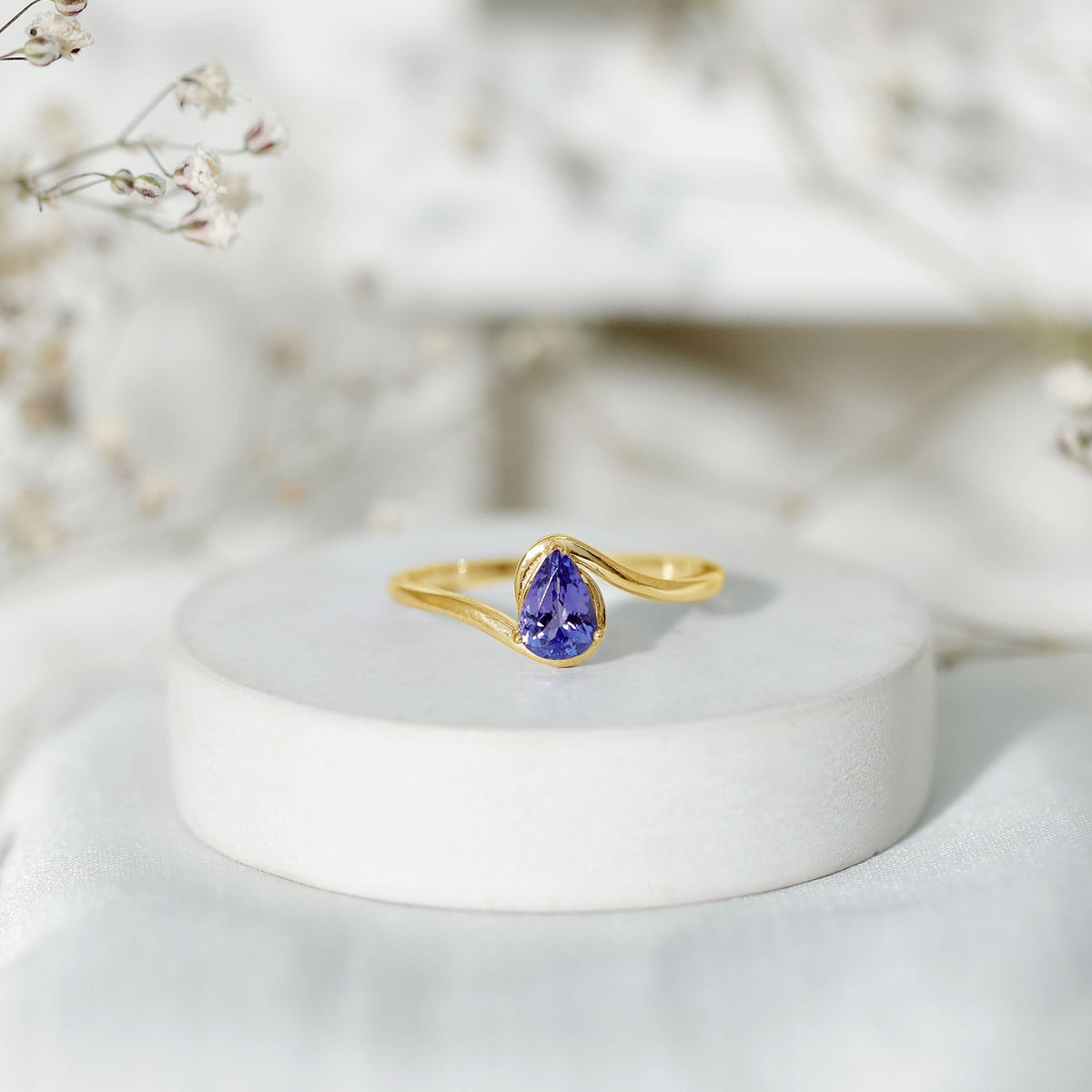 Natural Tanzanite Solitaire Engagement Ring with Bypass Shank