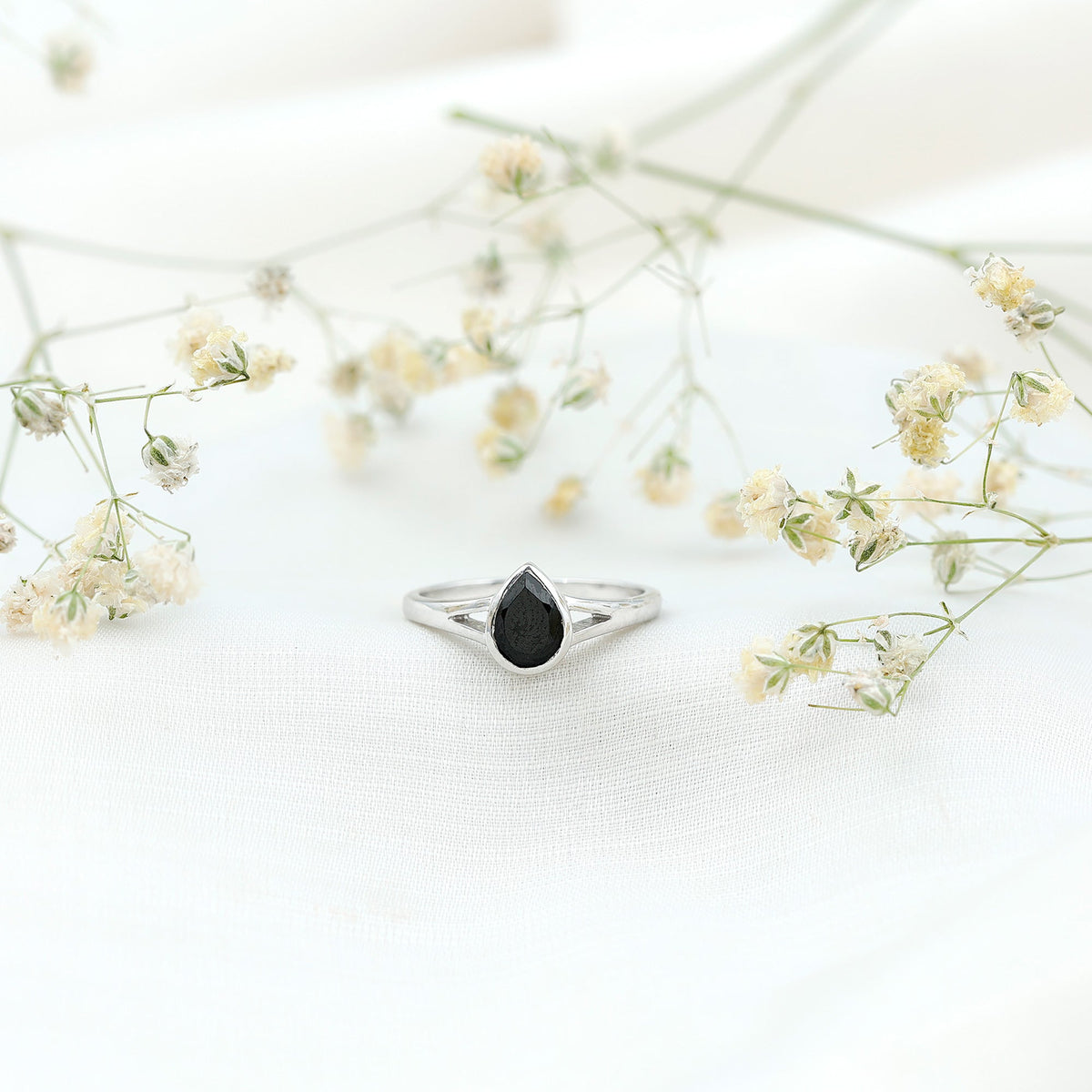 Bezel Set Black Onyx Pear Engagement Ring in Split Shank