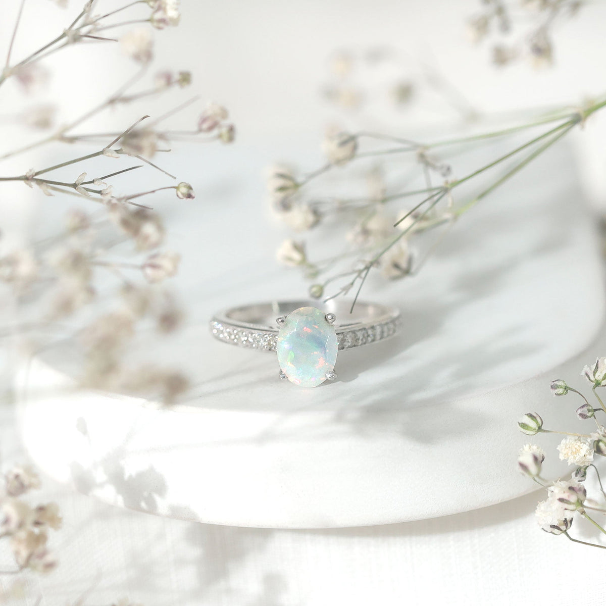 Natural 1.2 Carat Ethiopian Opal Oval Engagement Ring with Diamond Side Stones