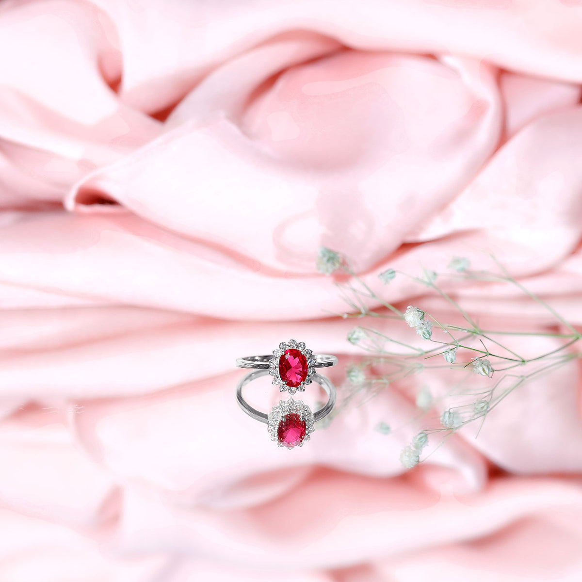 1.5 Carat Oval Shape Lab Grown Ruby and Diamond Halo Engagement Ring