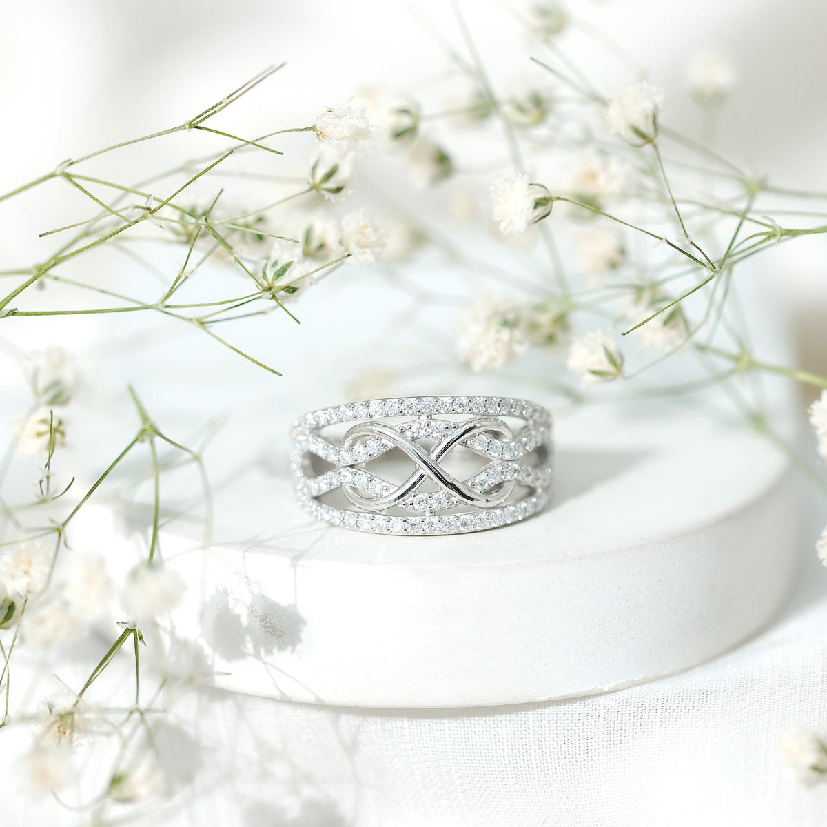 Designer Moissanite Infinity Anniversary Band in Silver