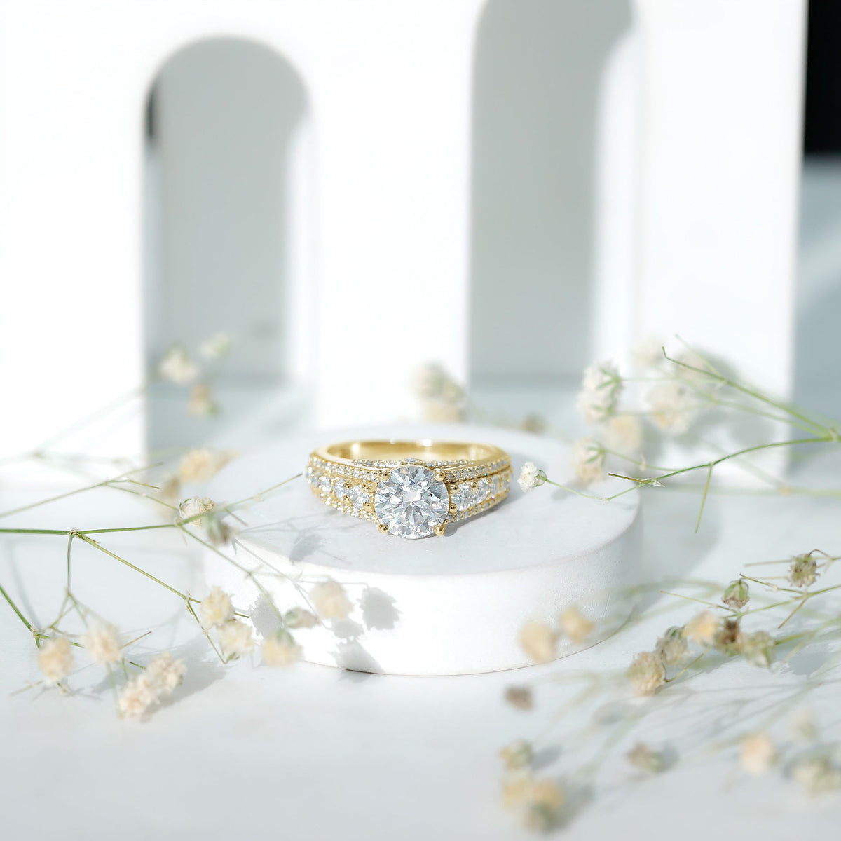 Round Brilliant Cut Moissanite Side Stone Engagement Ring