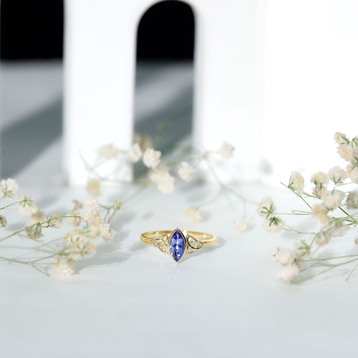 Natural Bezel Set Marquise Tanzanite Promise Ring with Celtic Knot