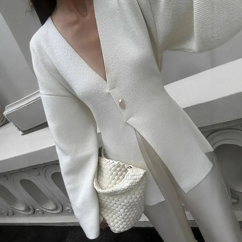 V-Neck, Buckle Closure, and Slit Detail